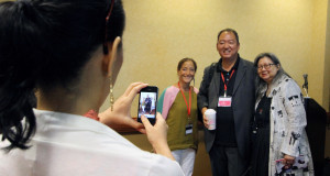 Lia Chang, left, New York bureau chief of AsianConnections.com, snaps a photo on her iPhone, from left, Sachi Cunningham, Chang . Lee and Marilynn K. Yee. COURTLAND THOMAS | VOICES
