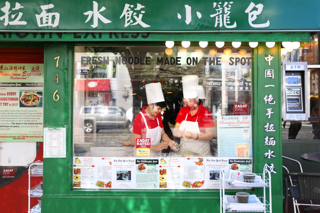 Two women make dumplings in China Express's window on Wednesday, August 13, 2014. (Brian Nguyen/AAJA VOICES)