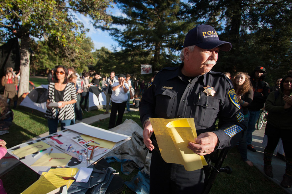 Officer Raymond Sutera presents the UC Davis policy against overnight camping to the Occupy UC Davis general assembly on November 18, 2011 Davis, Calif. (BRIAN NGUYEN/THE CALIFORNIA AGGIE)